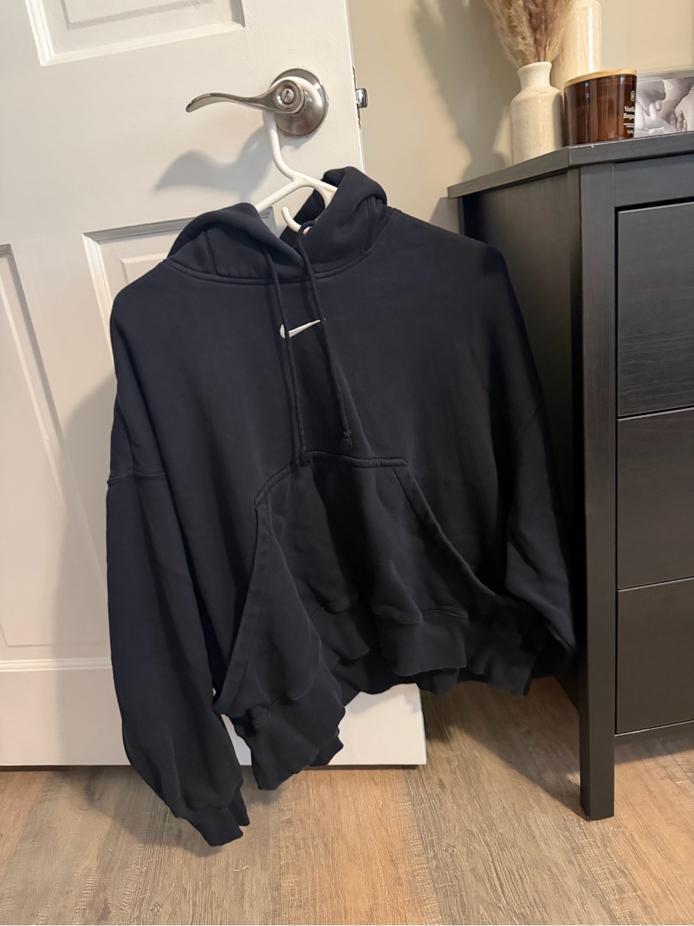 Nike Black Hoodie with White Tag and Swoosh